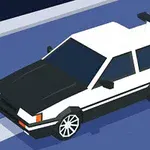 Valkeamusta auto, jossa on spoileri, kuvattuna sinisellä tiellä