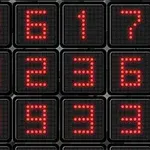 Punaiset LED-numerot mustilla taustoilla muodostavat matriisin