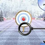 Talvinen maisema, jossa jousen tähtäin ja maalitaulu 30 metrin päässä lumisessa ympäristössä lumisten puiden keskellä