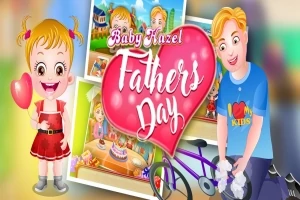 Lapsi ja mies pitävät sydämen muotoista kylttiä, jossa lukee Baby Hazel Fathers Day, taustalla on värikkäitä kuvia