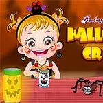 Lapsi hymyilee Halloween-aiheisten askarteluiden äärellä, ja edessä on kurpitsalyhty ja hämähäkki koristeita eloisalla oranssilla taustalla