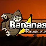 Kuva esittää hymyilevää apinaa, joka pitää banaania ja seisoo kyltin vieressä, jossa lukee Bananas Joe, taustalla oranssi auringonlasku