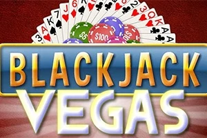 Korttipakka ja kasinopoleteja Blackjack Vegas -tekstin taustalla