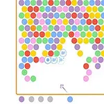Värikkäitä palloja ruudukossa, jossa osa palloista on ryhmitelty ja alhaalla on nuoli osoittamassa liikkeen suuntaa