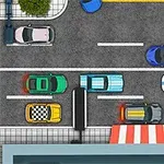 Ylhäältä kuvattu kaupunkikatu, jossa liikkuu erilaisia autoja ja näkyy jalkakäytävä, puu sekä katos