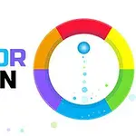 Värikäs teksti COLOR SPIN ja ympyrä, jossa on eri värisiä kaistaleita, keskellä sininen pallo