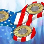 Fidget spinner, jossa on USA:n lipun värit ja kuviot, teksti FREEPLAYNOW metalliosissa