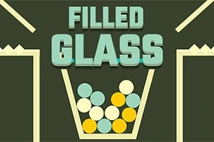 Lasin sisälle putoaa erivärisiä palloja, ja ylhäällä lukee FILLED GLASS
