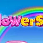 Tekstissä flowers on vaaleanpunaisia ja keltaisia kirjaimia, joissa on kukkakuvioita, taustalla sateenkaari ja sininen taivas