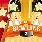 Kultainen pokaali keilojen ja tähtien kanssa, keskellä lukee GO BOWLING 2