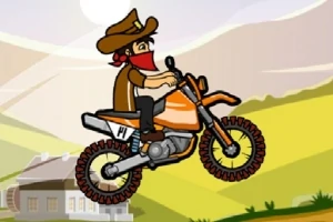 Mies cowboy-hatussa ajaa motocross-pyörällä mäkisessä maalaismaisemassa