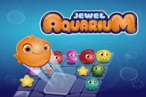Kuvassa on värikkäitä, iloisia meriolentoja esiintymässä sinisellä taustalla nimellä Jewel Aquarium
