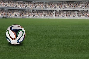 Jalkapallo kentällä stadionin edessä