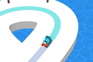 Punainen ja sininen auto ajaa valkoisella, kapealla tiellä sinistä vettä vasten