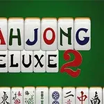Mahjong-laattoja vihreällä taustalla, keskellä teksti MAHJONG DELUXE 2
