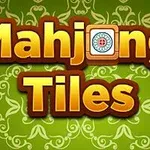 Kuvassa on vihreä tausta kukkakoristeilla ja teksti Mahjong Tiles kultaisilla kirjaimilla