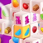 Valkoisia palikoita, joissa on värikkäitä hedelmien, karamellien ja suklaan kuvia violettia taustaa vasten