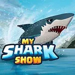Hai hyppää vedestä sinisen taivaan alla, taustalla metsäisiä vuoria ja etualalla teksti My Shark Show