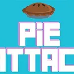 Päällimmäisenä ruskea piirakka, jonka alla lukee suurilla valkoisilla kirjaimilla Pie Attack turkoosilla taustalla