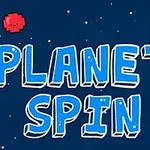 Sinisellä taustalla on teksti Planet Spin, ympärillä punainen ja vihreä hymyilevä pikselöity planeetta
