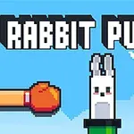 Tekstissä lukee Rabbit Punch, ja siinä on kuva, jossa kaksi nyrkkeilyhanskaa, oranssi ja sininen, ovat nousemassa kohti putkesta nousevaa pikseligrafiikalla piirrettyä jänistä