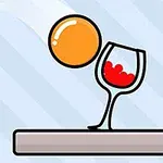 Oranssi pallo pomppii kohti punaviinilasillista, joka on alustalla