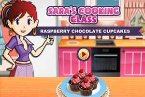 Piirroshahmo keittiössä seisoo vieressä, ja pöydällä on vadelma-suklaa-cupcakeja sinisellä lautasella