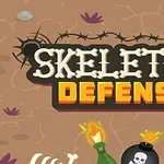 Pääkalloaiheinen kuva, jossa on piikkilankaa, pommi, luurangon kädet ja teksti Skeleton Defense