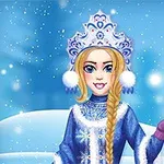 Nuori nainen sinisessä talviasussa ja -lakituksessa seisoo lumisessa maisemassa pitäen kevyttä sauvaa, jonka päässä on lumihiutale
