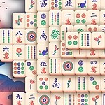 Mahjong-laattoja, taustalla perinteinen kiinalainen pagodi ja onnea tuova kissojen patsas