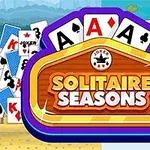 Kuvassa on kortteja, joiden edessä on puinen kyltti, jossa lukee Solitaire Seasons, ja taustalla näkyy ranta ja lampi