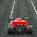 Punainen formula-auto ajamassa pitkin asfalttista kilparataa
