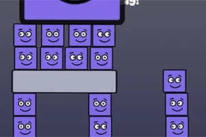 Violette hymyilevät kuutiot on pinottu torniksi tummanharmaalla taustalla