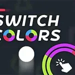 Värikkäitä ympyröitä ja teksti “Switch Colors” tummalla taustalla