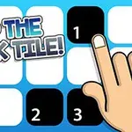 Sormi osoittaa numerollisia mustia laattoja, taustalla valkoisia laattoja ja teksti TAP THE BLACK TILE!