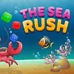 Punainen rapu merenpohjassa ilmeikkäällä katseella, ympärillä värikkäitä kuutioita, pieni kala, koralleja ja kuplia; oikeassa yläkulmassa värikkäät sanat THE SEA RUSH
