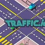 Risteys, jossa kulkee autoja eri suuntiin, ja keskiössä teksti TRAFFIC