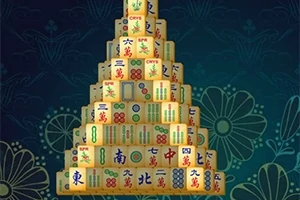 Pyramidin muotoinen palikkatorni värikkäillä symboleilla tummalla taustalla