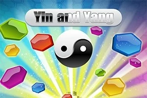 Yin ja yang -symboli sateenkaaren väreissä hehkuvien jalokivien keskellä
