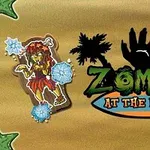 Zombihahmo rannalla palmun edessä; taustalla teksti Zombies at the Beach ja palmuja